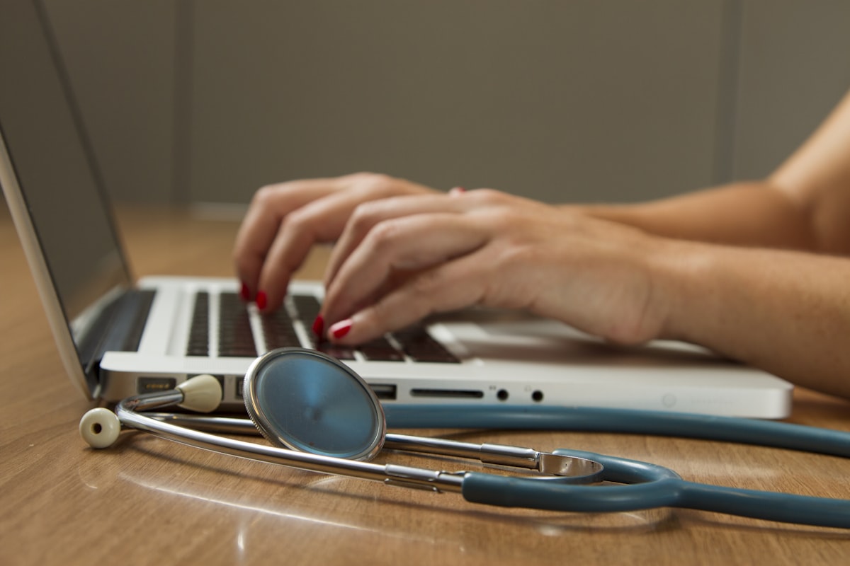 Healthcare professional at a modern workstation